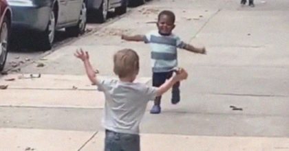 Toddlers breaking the racism mentality when they hug each other unconditionally after not seeing each other for a few days.