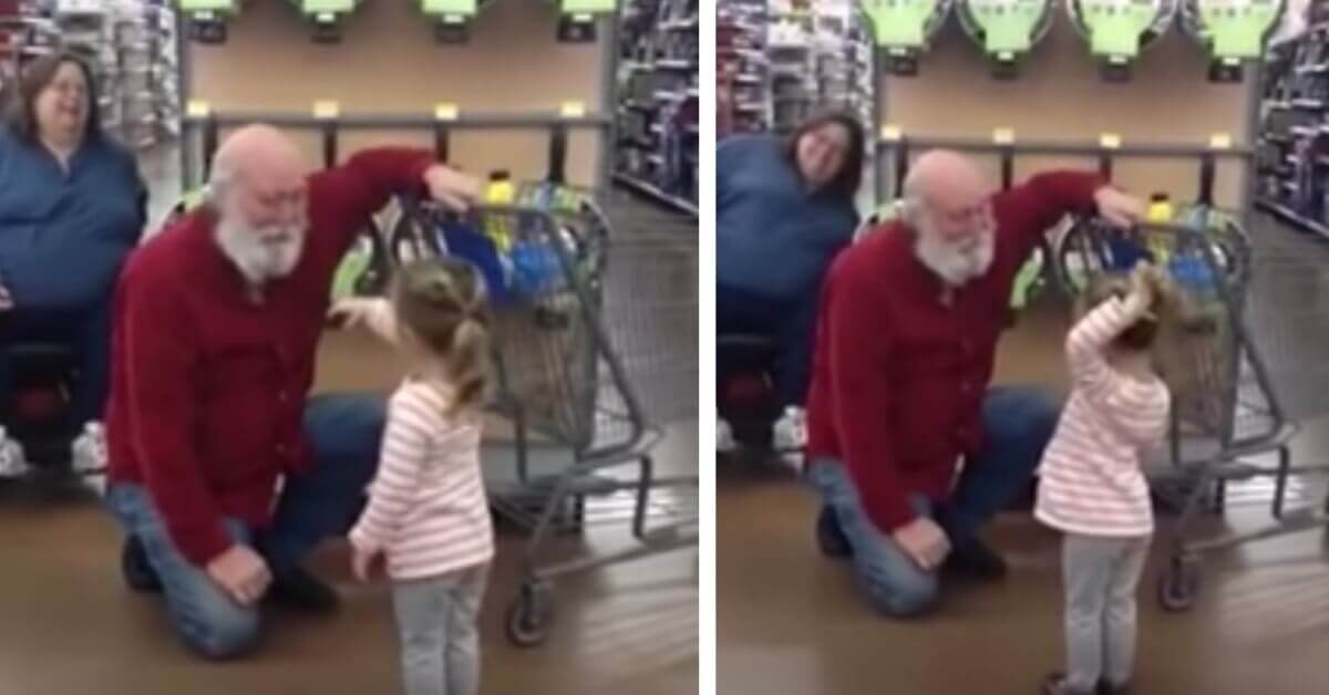 Little girl thinks she found Santa while she was shopping with her family 