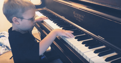 Visually impaired kid can play the piano in a fantastic way.