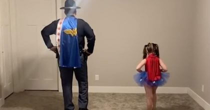 State trooper performs a dance routine with his daughter