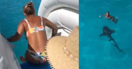 Woman Slides From a Yatch Directly Into The Pathway of a Shark.