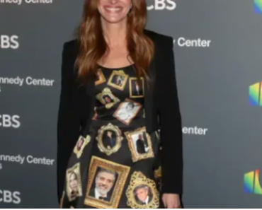 Julia Roberts showed up to an event honoring George Clooney in a dress that had the actor’s face all over it –