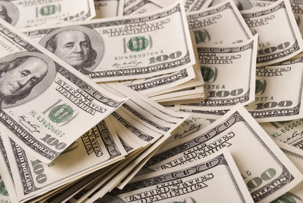 A stack of one hundred dollar bills | Source: Shutterstock