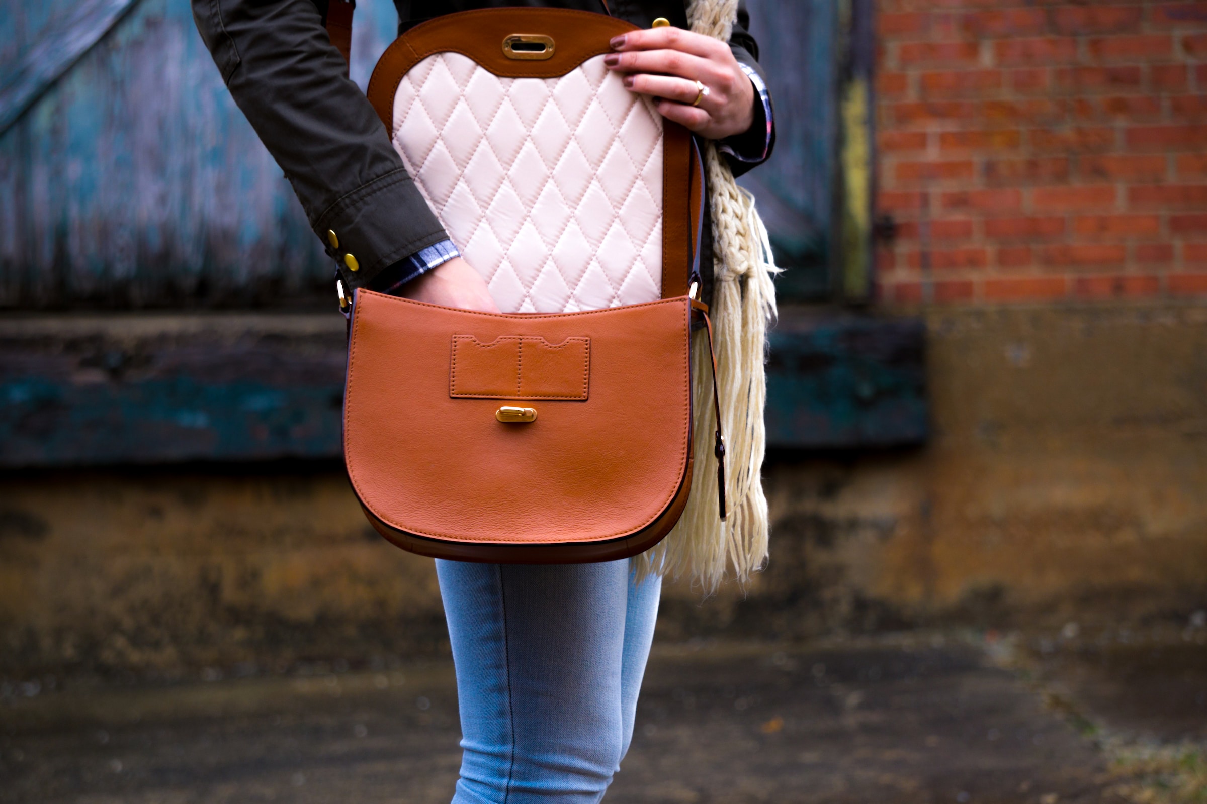 A woman checking her purse | Source: Unsplash