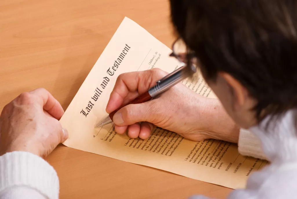 A person writing a will | Source: Shutterstock