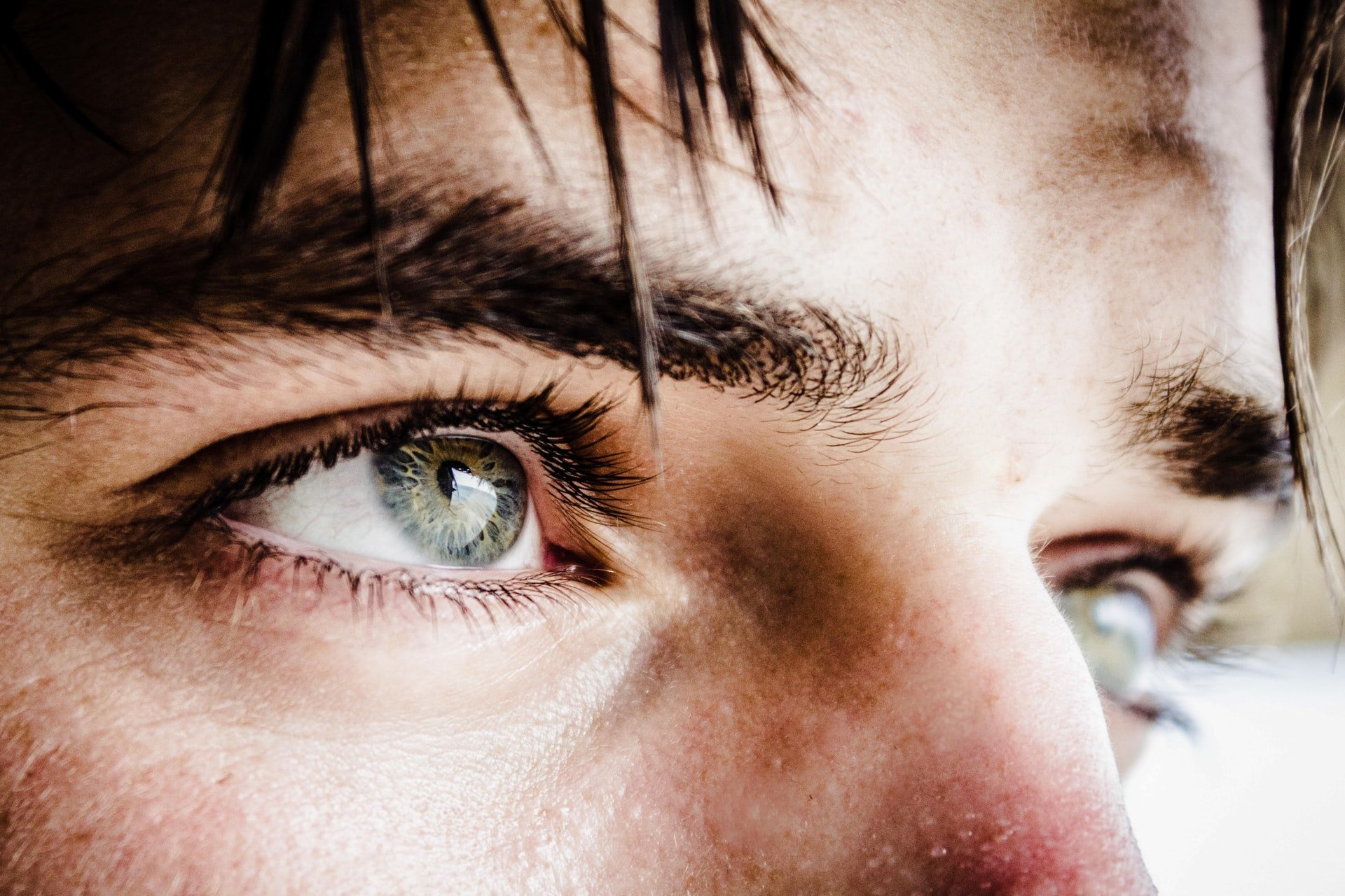 A close-up of a green-eyed man | Source: Unsplash