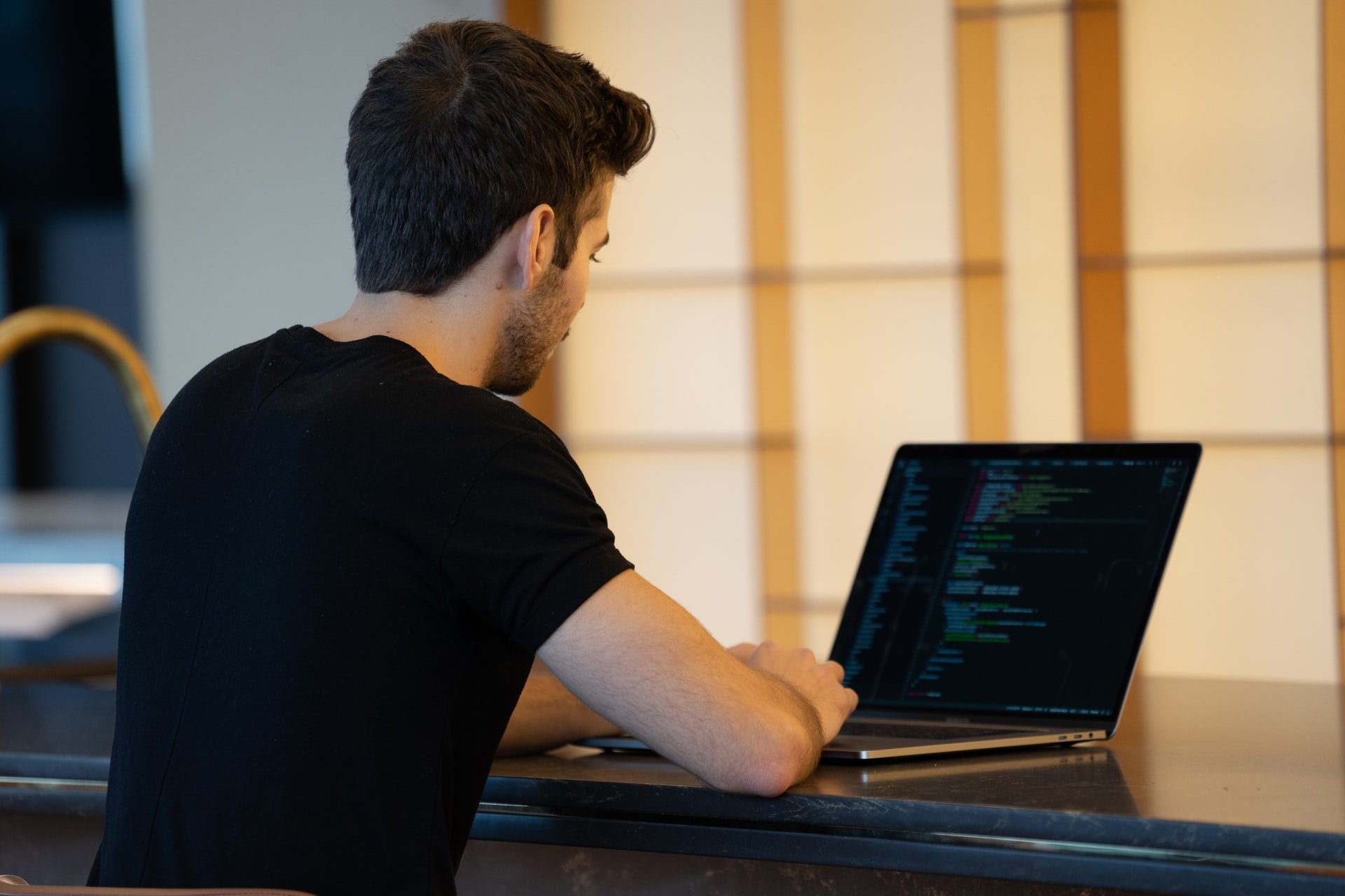 A man on his laptop | Source: Unsplash