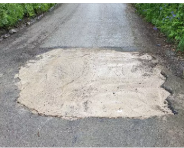 Motorist Takes Matters into Their Own Hands and Fills Giant Pothole in Cornwall