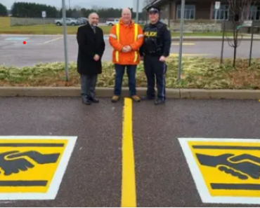 Here’s what a handshake symbol on a parking space means