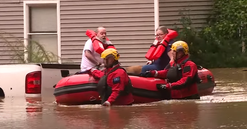 Rescue services evacuating people, as seen in a video dated October 3, 2024 | Source: YouTube/Global News