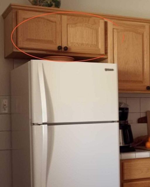 Correct usage of cupboards above Fridge