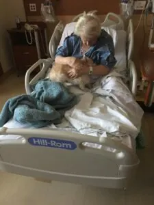 Woman Brining Pet Dog for Her Sick Grandma