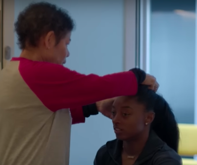 Nellie Biles doing Simone Biles' hair, posted on July 15, 2024 | Source: YouTube/Netflix