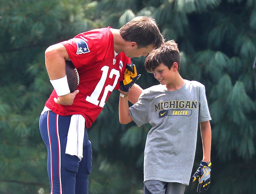 Tom Brady and Jack Moynahan at New England Patriots training camp in Foxborough, Massachusetts, on August 7, 2018 | Source: Getty Images