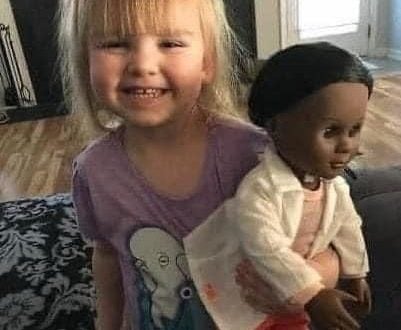 Two year old has the perfect response for cashier who questioned black doll