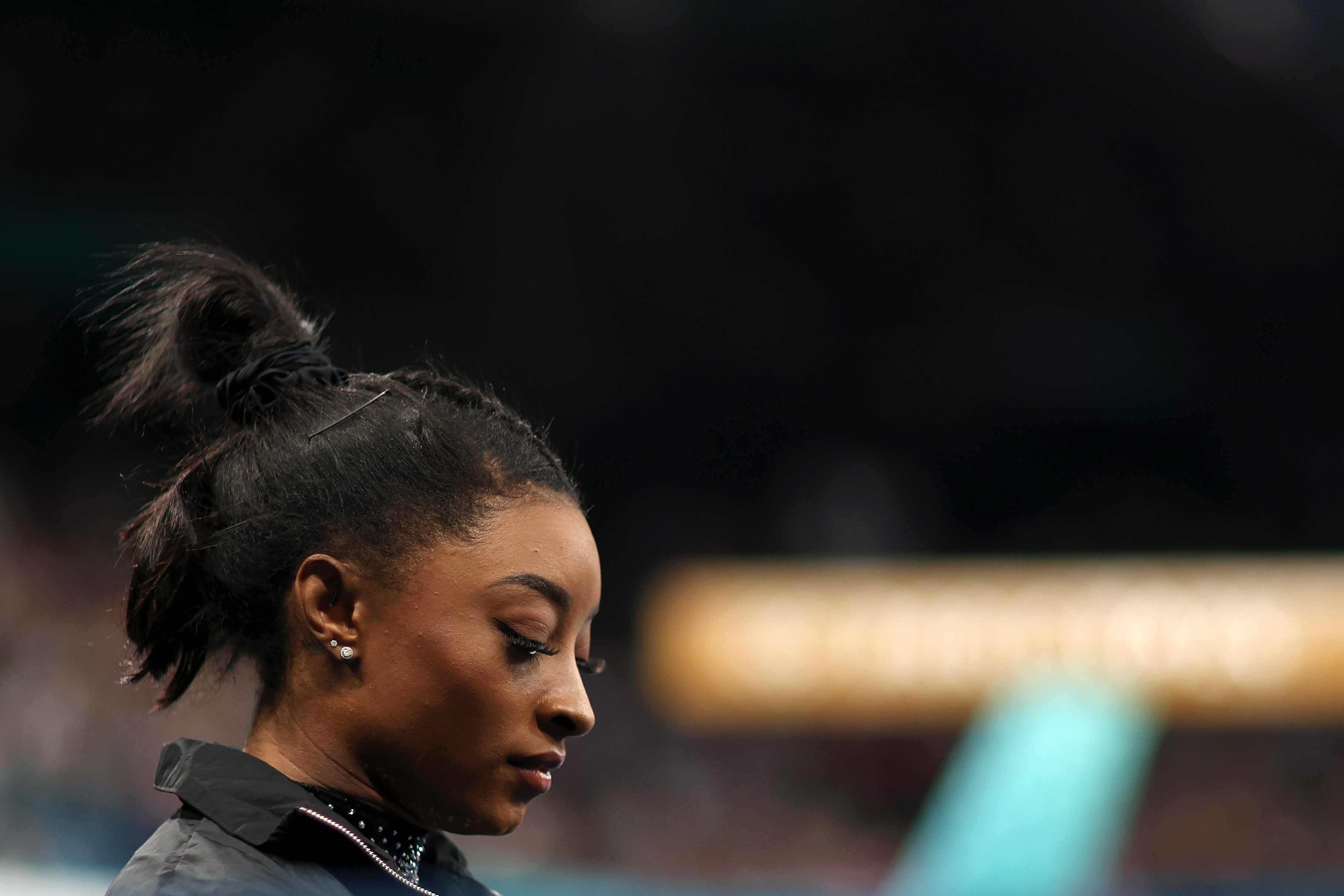 Simone Biles looks on before her balance beam routine during the Women's Artistic Gymnastics Qualification at the Paris 2024 Olympics on July 28, 2024 | Source: Getty Images