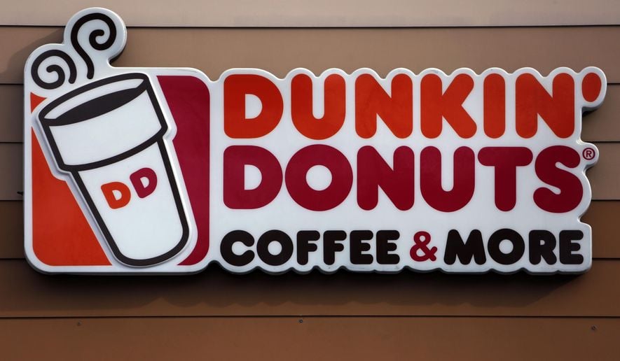 This Jan. 22, 2018, photo shows the Dunkin' Donuts log on a shop in Mount Lebanon, Pa. Massachusetts-based Dunkin' Donuts announced an updated menu on Friday, July 27, which is featuring the company's first gluten-free product - a fudge brownie. (AP Photo/Gene J. Puskar)