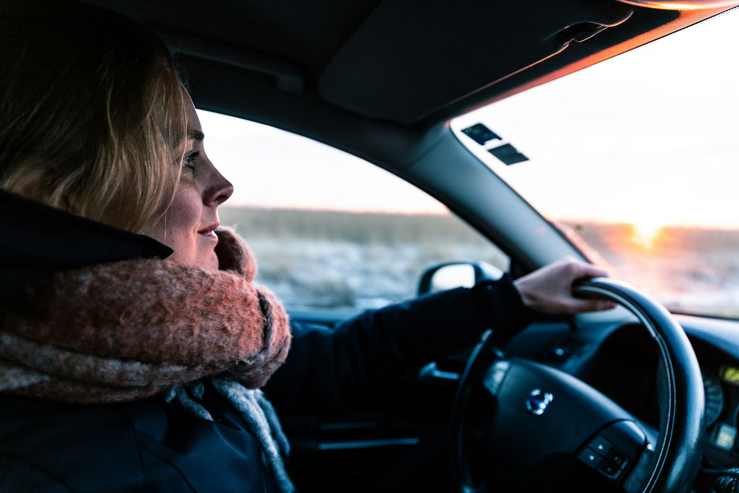 A woman driving a car | Source: Unsplash