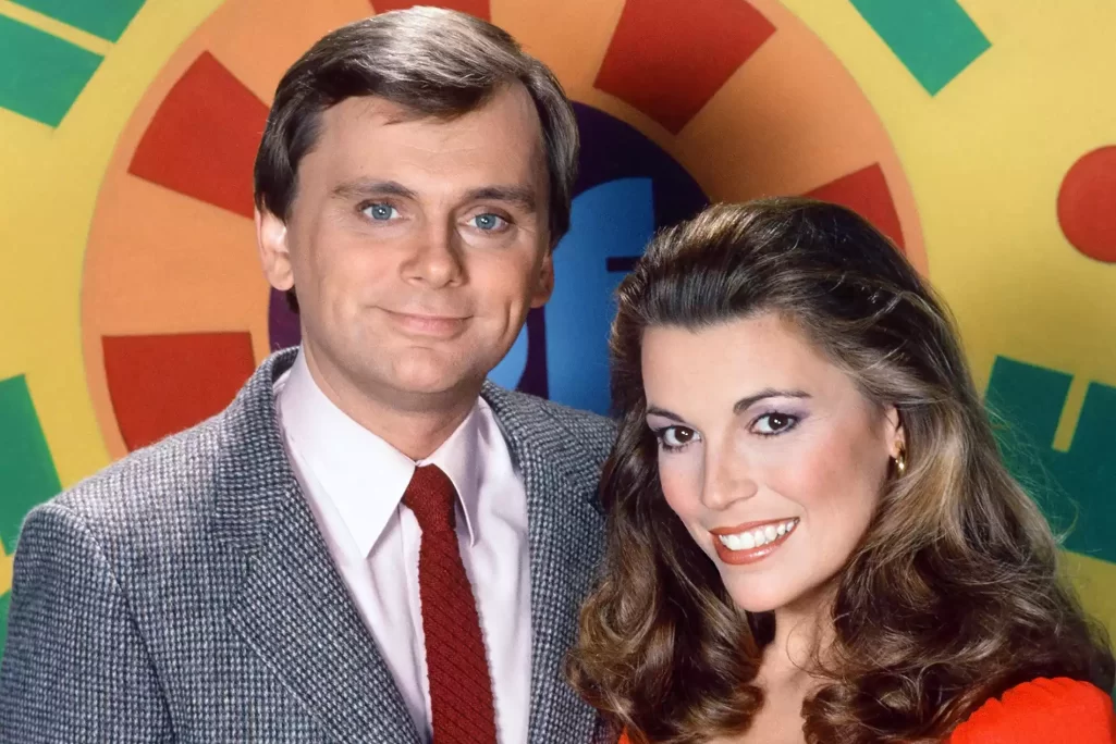 Host Pat Sajak, hostess Vanna White