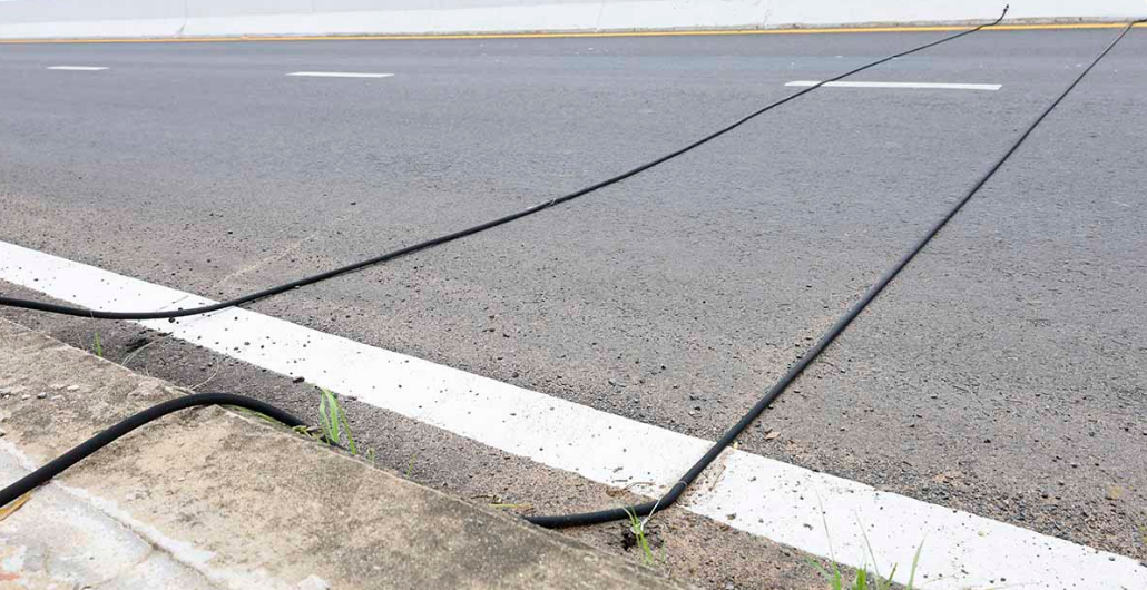 If You Ever See Black Cables Stretching Across The Road, This Is What You Should Do