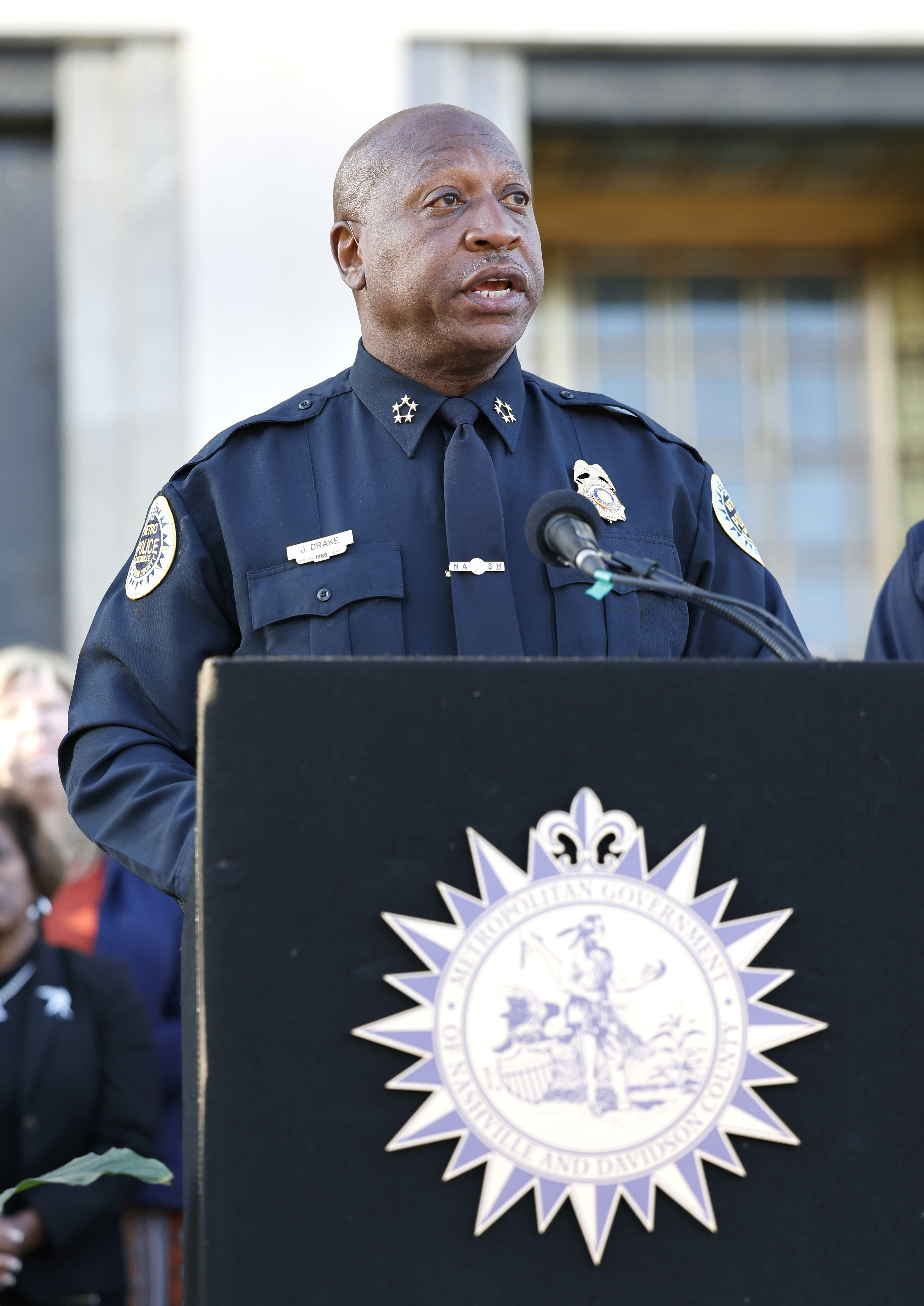 Nashville Chief of Police John Drake speaking at a candlelight vigil to mourn and honor the lives of the victims, survivors and families of The Covenant School tragedy in Nashville, Tennessee on March 29, 2023. | Source: Getty Images