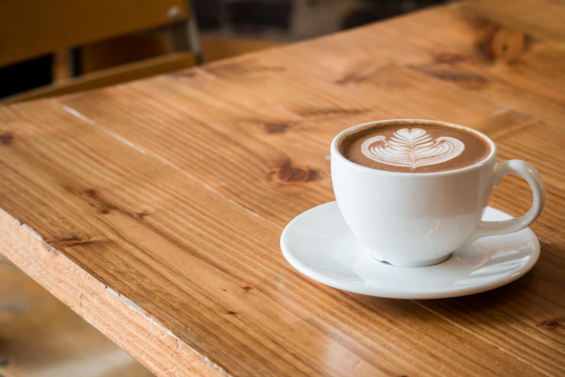 A coffee mug on a table | Source: Pexels