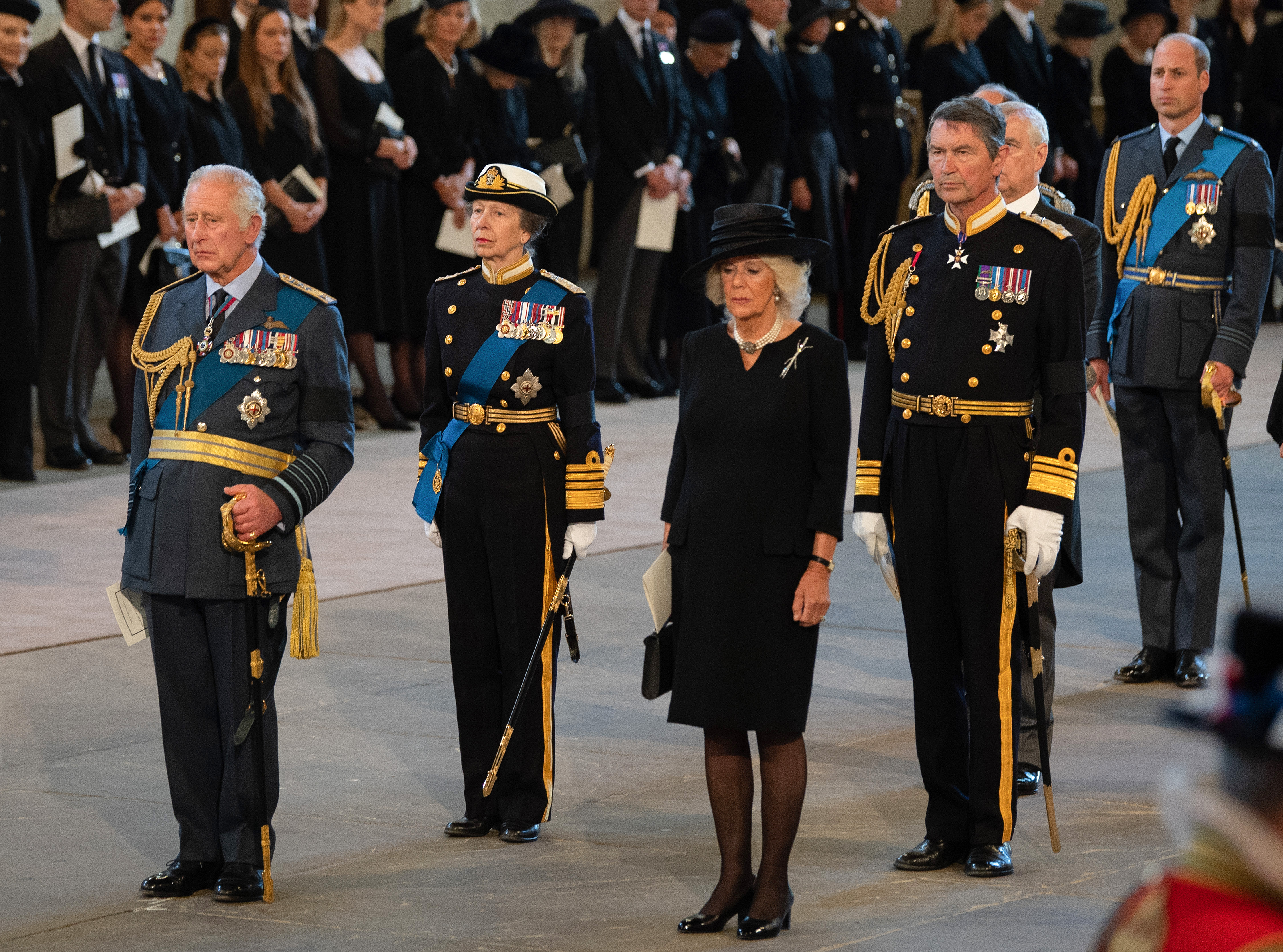 King Charles III, Queen Camilla, and Princess Anne paying their respects in the Palace of Westminster during the procession for the Lying-in State of Queen Elizabeth II on September 14, 2022, in London, England. | Source: Getty Images