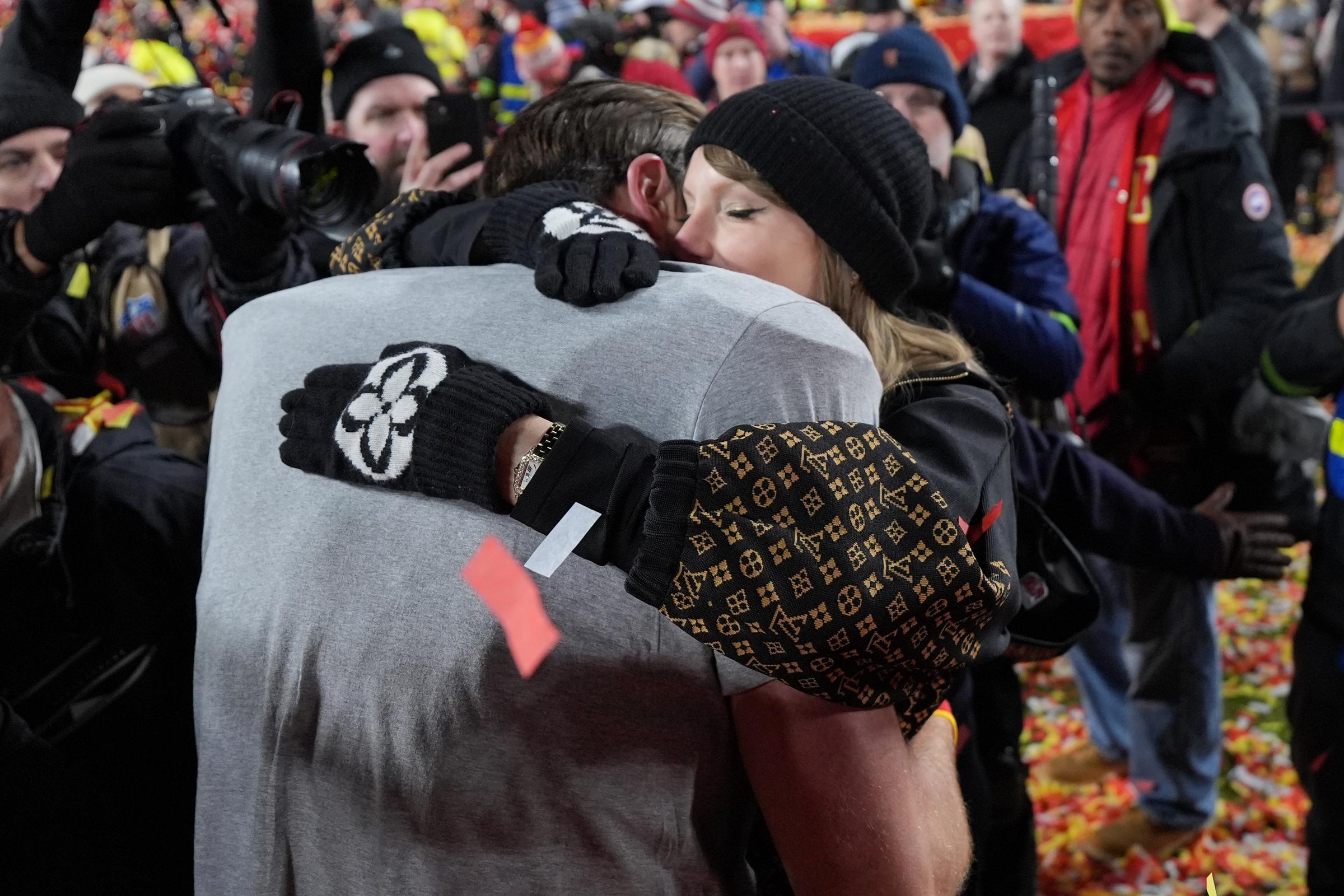 Travis Kelce and Taylor Swift are seen embracing each other Arrowhead Stadium on January 26, 2025 | Source: Getty Images