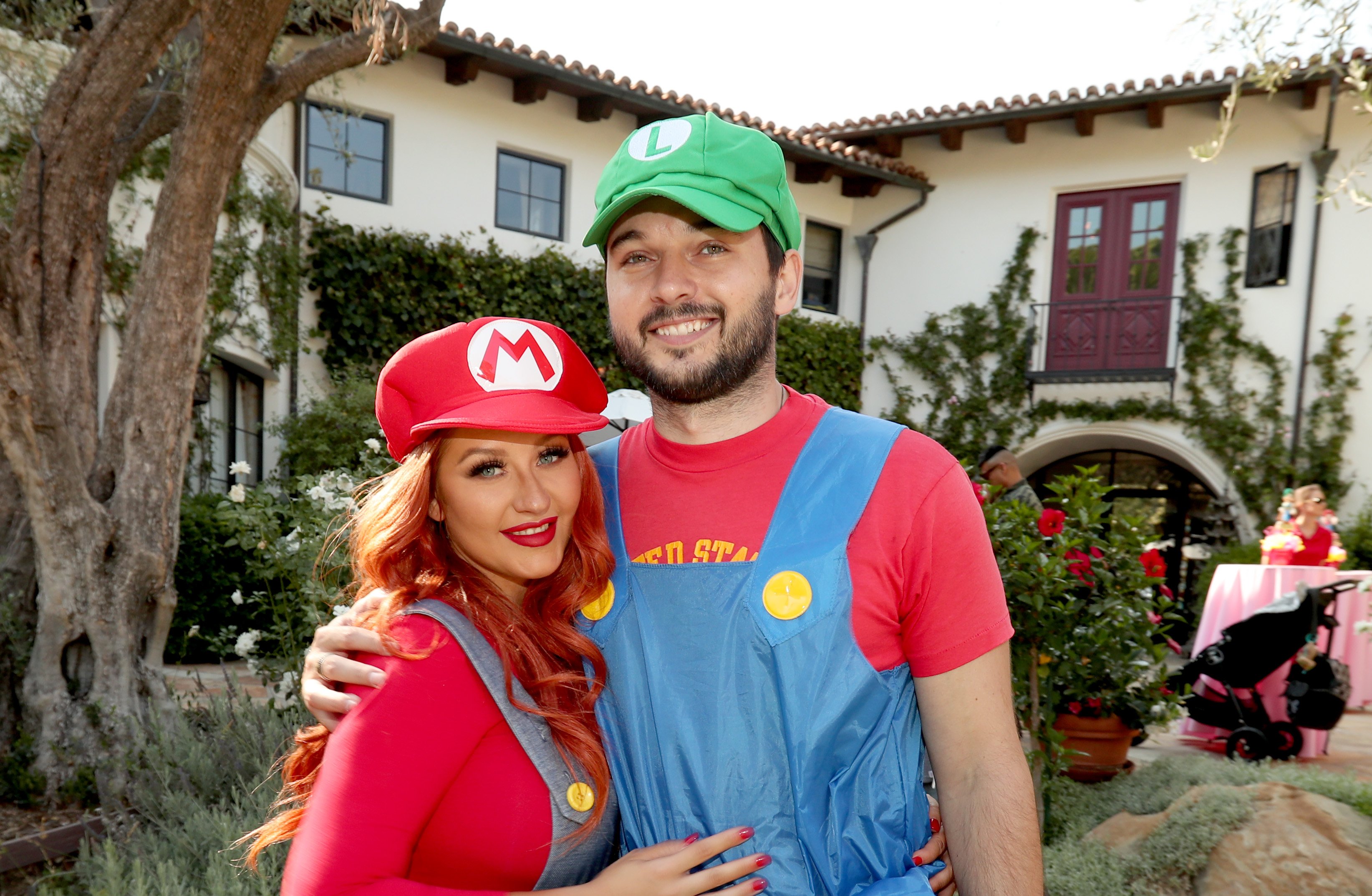 Christina Aguilera and Matthew Rutler posing for a picture during their daughter's birthday party. | Source: Getty Images