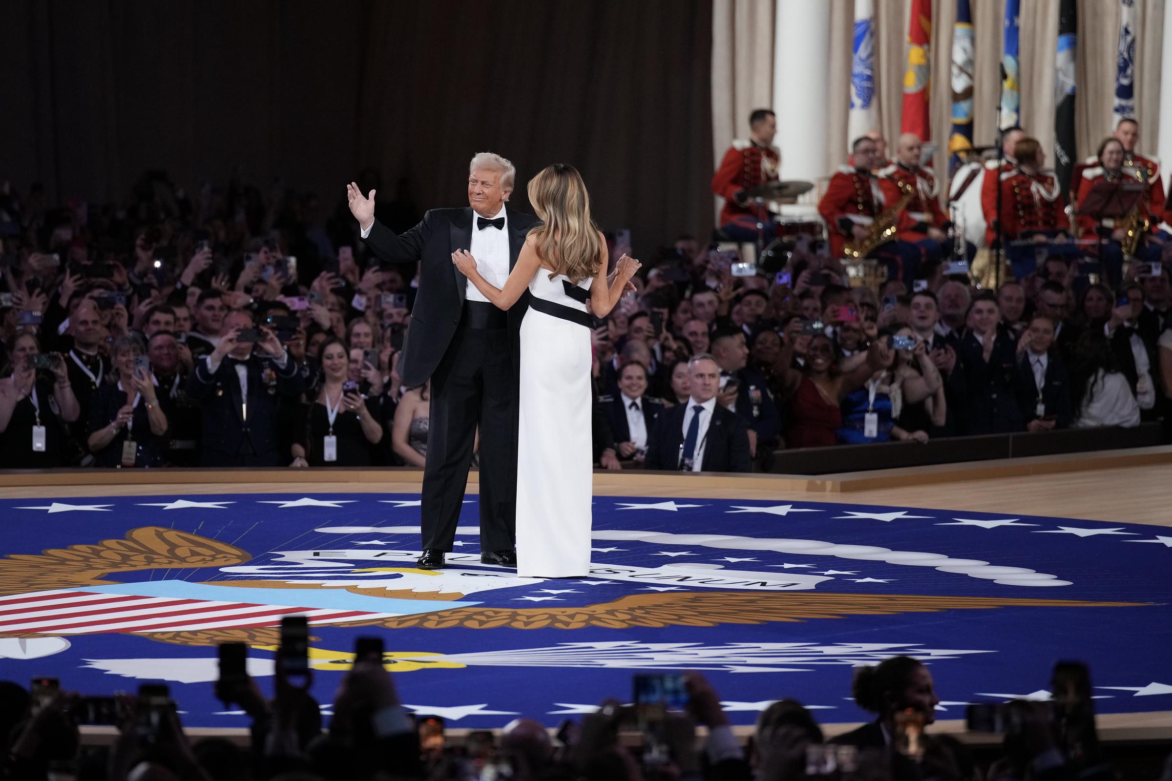 Donald Trump looking out into the crowd with glee as he shares a dance with Melania Trump. | Source: Getty Images