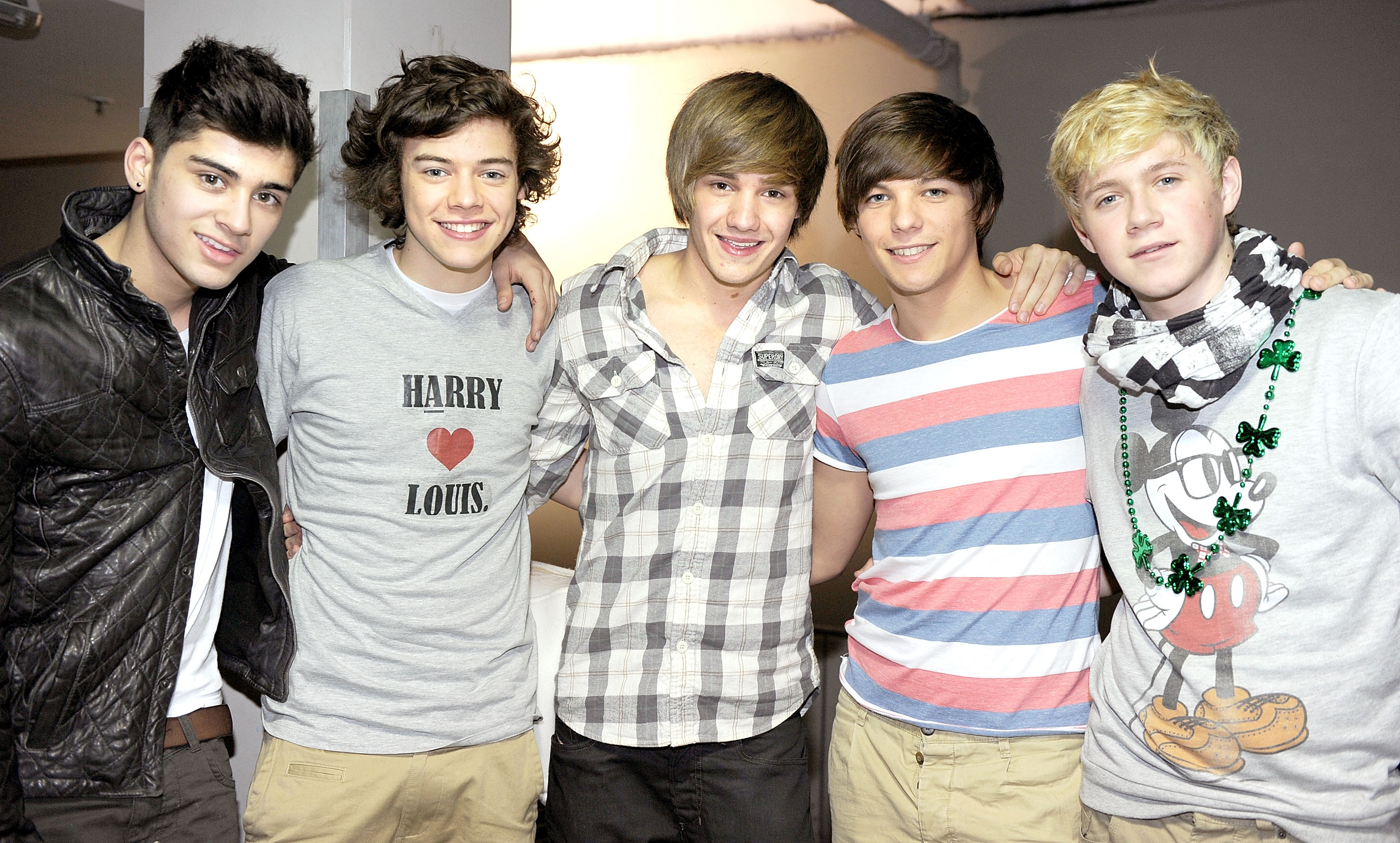 Zayn Malik, Harry Styles, Liam Payne, Louis Tomlinson, and Niall Horan of One Direction at the signing their book "One Direction: Forever Young: Our Official X-Factor Story" in Manchester, England, on March 7, 2011. | Source: Getty Images