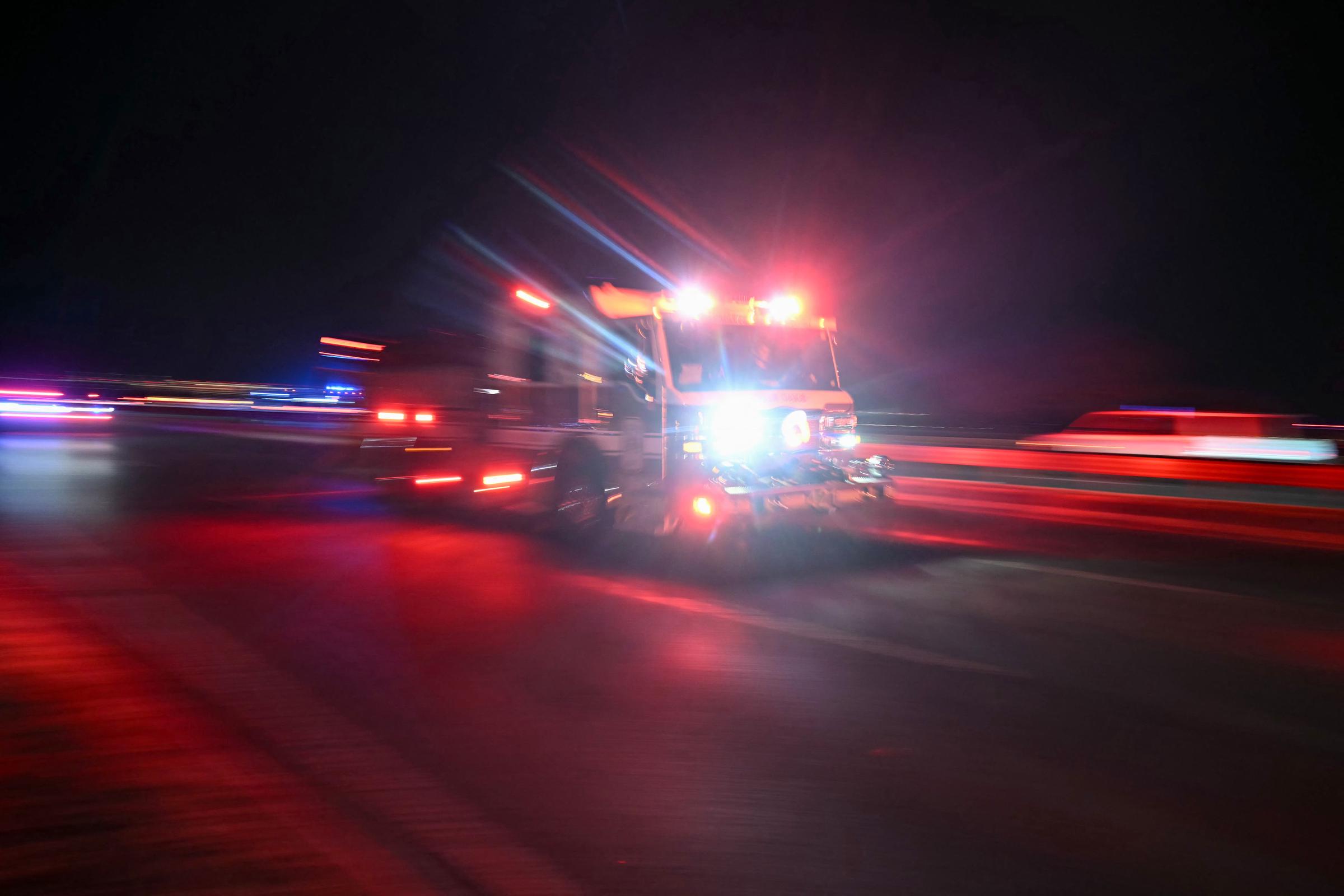 A firetruck heads toward the Potomac River near Reagan National Airport after an air crash in Washington, DC, on January 29, 2025 | Source: Getty Images