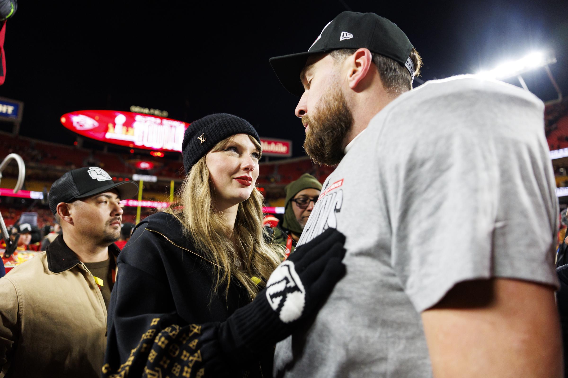 Tight end Travis Kelce #87 of the Kansas City Chiefs celebrates with Taylor Swift after the AFC Championship football game against the Buffalo Bills, at GEHA Field at Arrowhead Stadium on January 26, 2025, in Kansas City, Missouri | Source: Getty Images