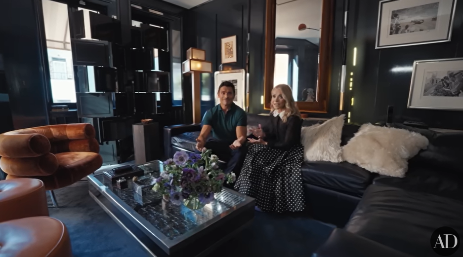 Mark Consuelos and Kelly Ripa inside their media room, dated December 10, 2024 | Source: YouTube/@Archdigest