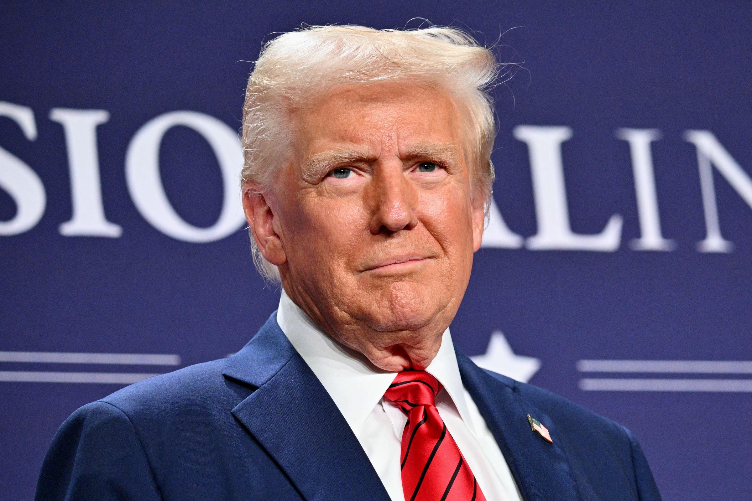 US President Donald Trump looks on after delivering remarks at the House Republican Members Conference Dinner at Trump National Doral in Miami, Florida, on January 27, 2025 | Source: Getty Images