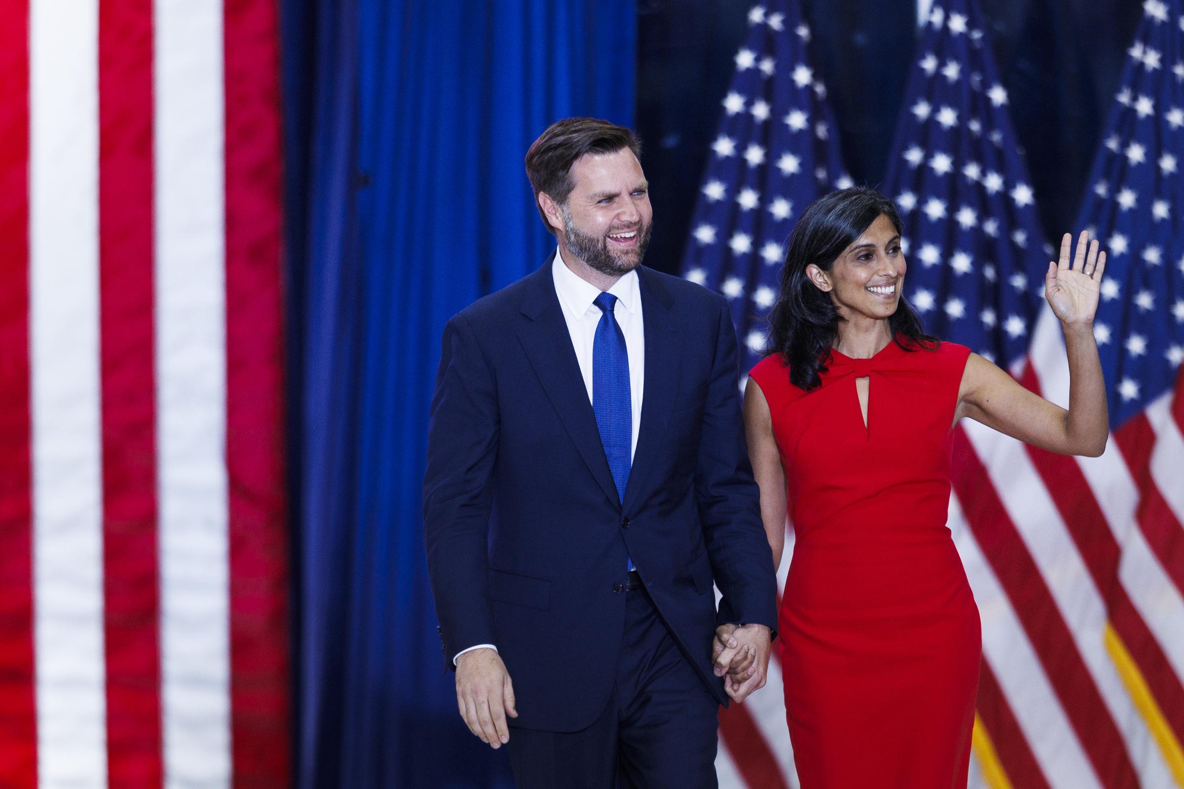 J. D. and Usha Vance on stage at Herb Brooks National Hockey Center in St. Cloud, Minnesota on July 27, 2024 | Source: Getty Images