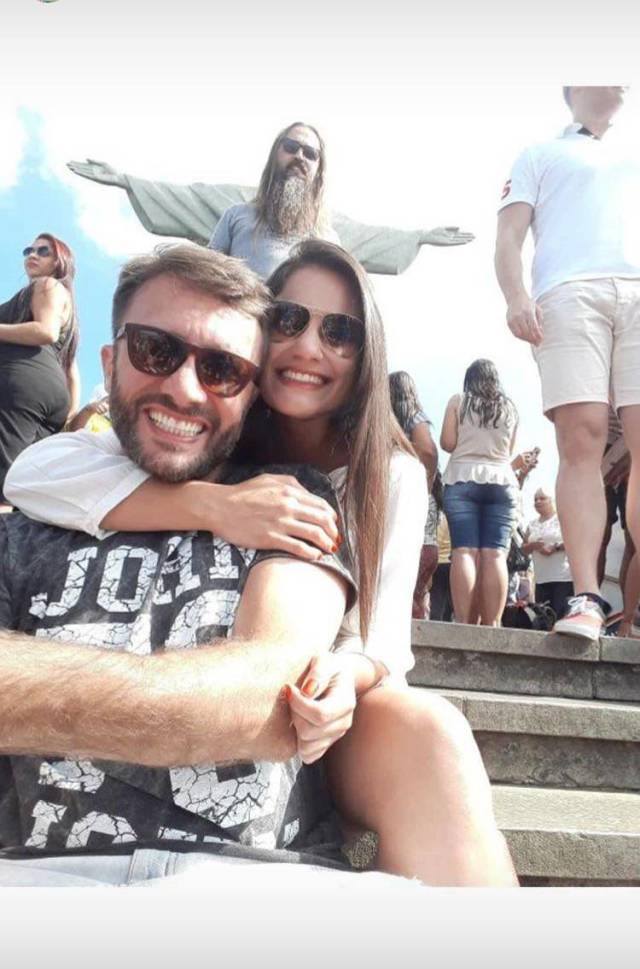 Funny photobomb of couple with Jesus