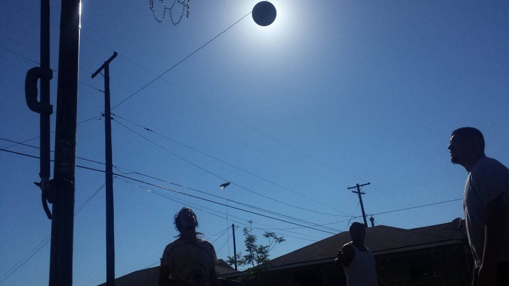 Perfectly timed photo of basketball solar eclipse