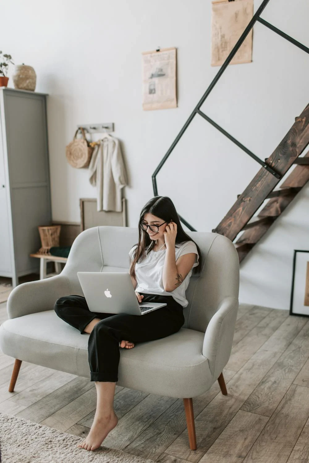 An excited woman looking at her laptop | Source: Pexels