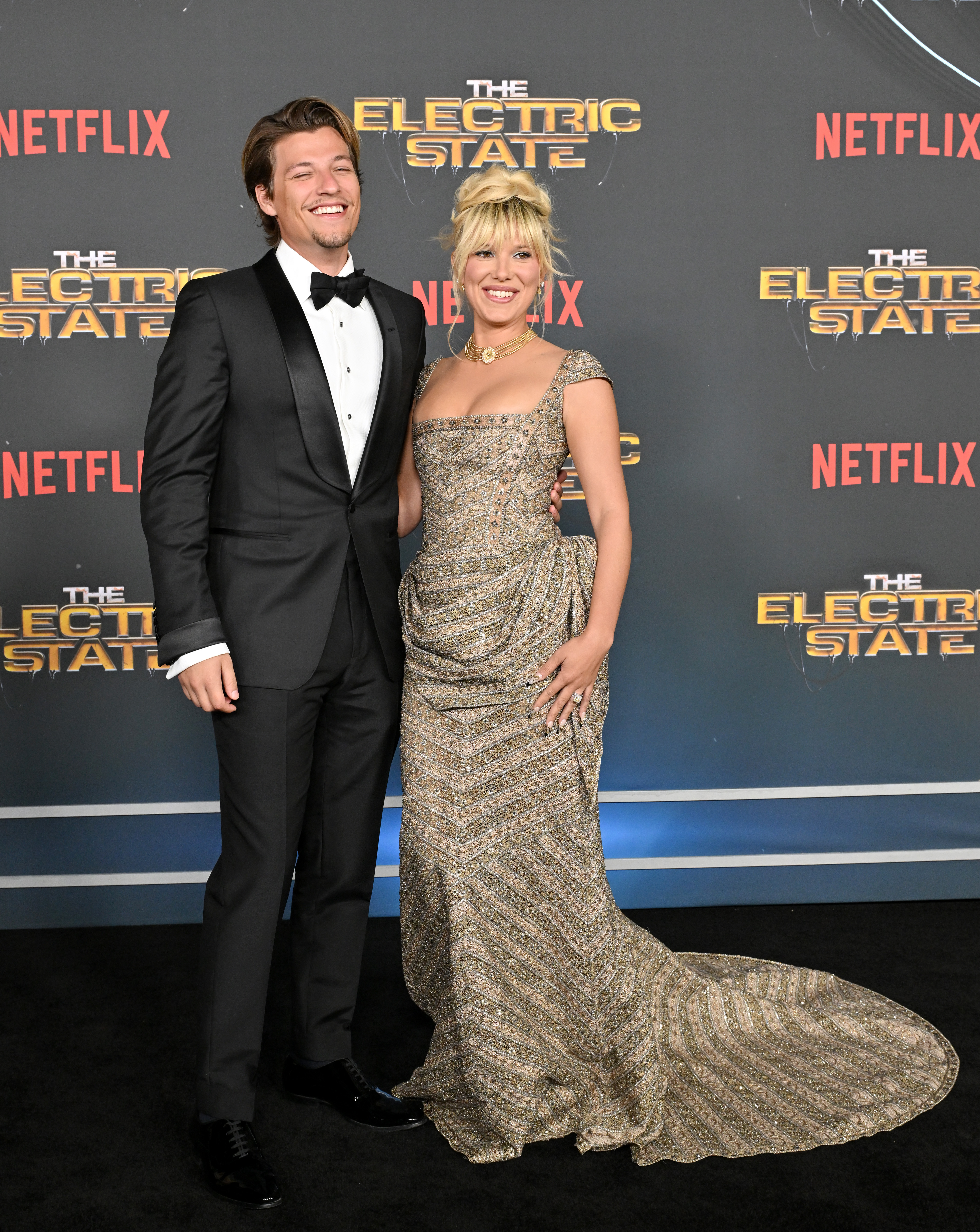 Jake Bongiovi and Millie Bobby Brown attend the World Premiere of Netflix's "The Electric State" at The Egyptian Theatre Hollywood in Los Angeles, California, on February 24, 2025 | Source: Getty Images