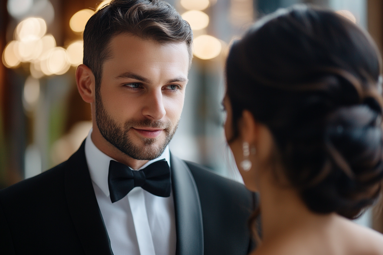 Two people in conversation at a formal event | Source: Midjourney