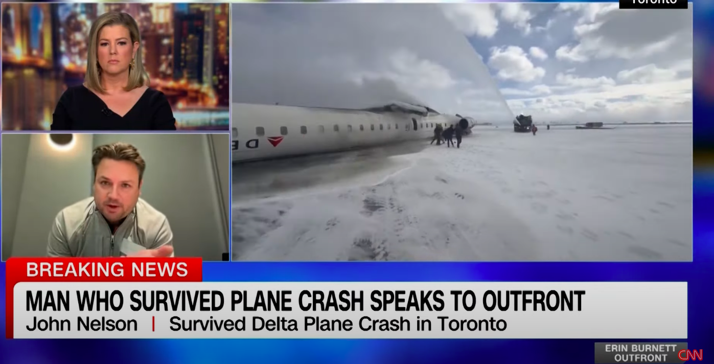 John Nelson speaking about the plane crash as his Facebook video of the crash played. | Source: YouTube/CNN