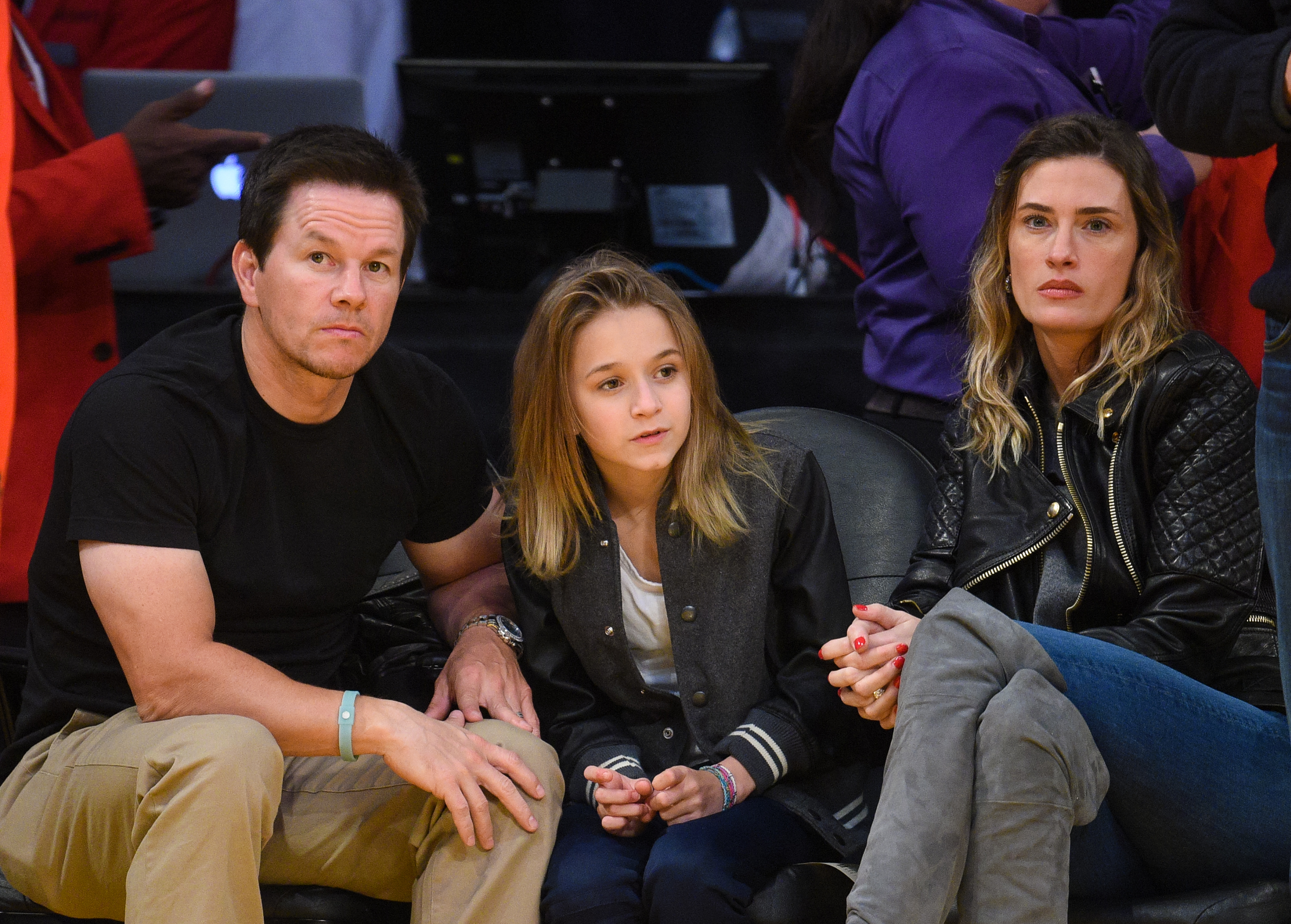 Mark Wahlberg, Ella Rae Wahlberg, and Rhea Durham attend a basketball game in Los Angeles, California on December 17, 2015. | Source: Getty Images