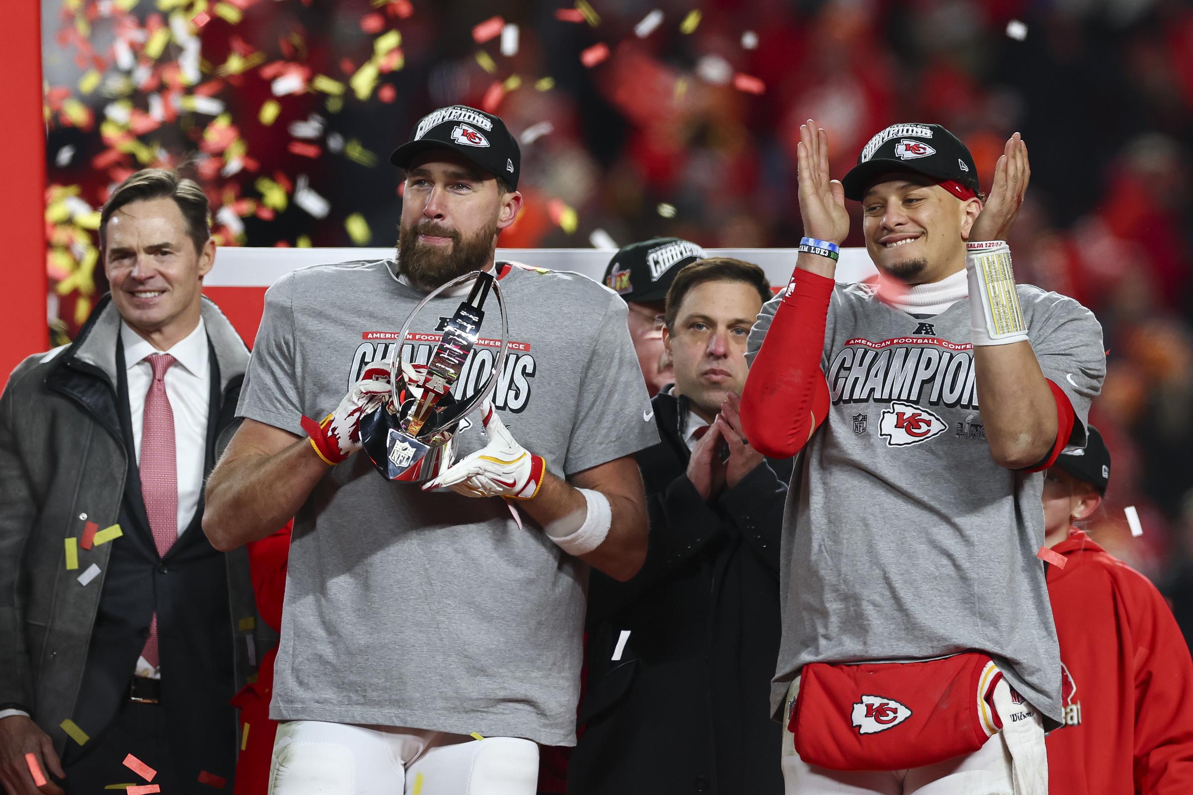 Patrick Mahomes and Travis Kelce celebrate on the podium following the AFC Championship Game against the Buffalo Bills at GEHA Field at Arrowhead Stadium on January 26, 2025, in Kansas City, Missouri | Source: Getty Images