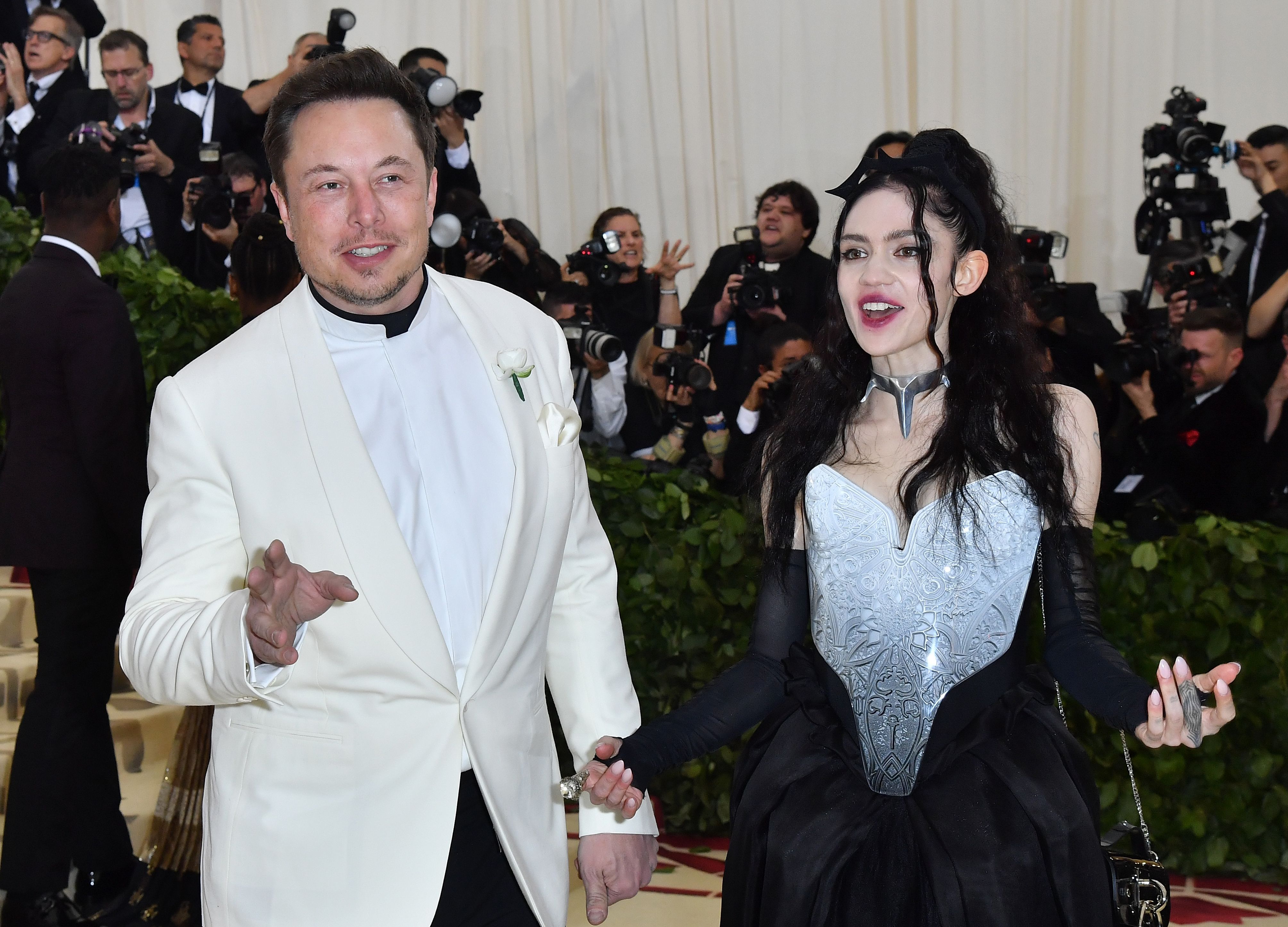 Elon Musk and Grimes arrive for the Met Gala at the Metropolitan Museum of Art in New York on May 7, 2018. | Source: Getty Images