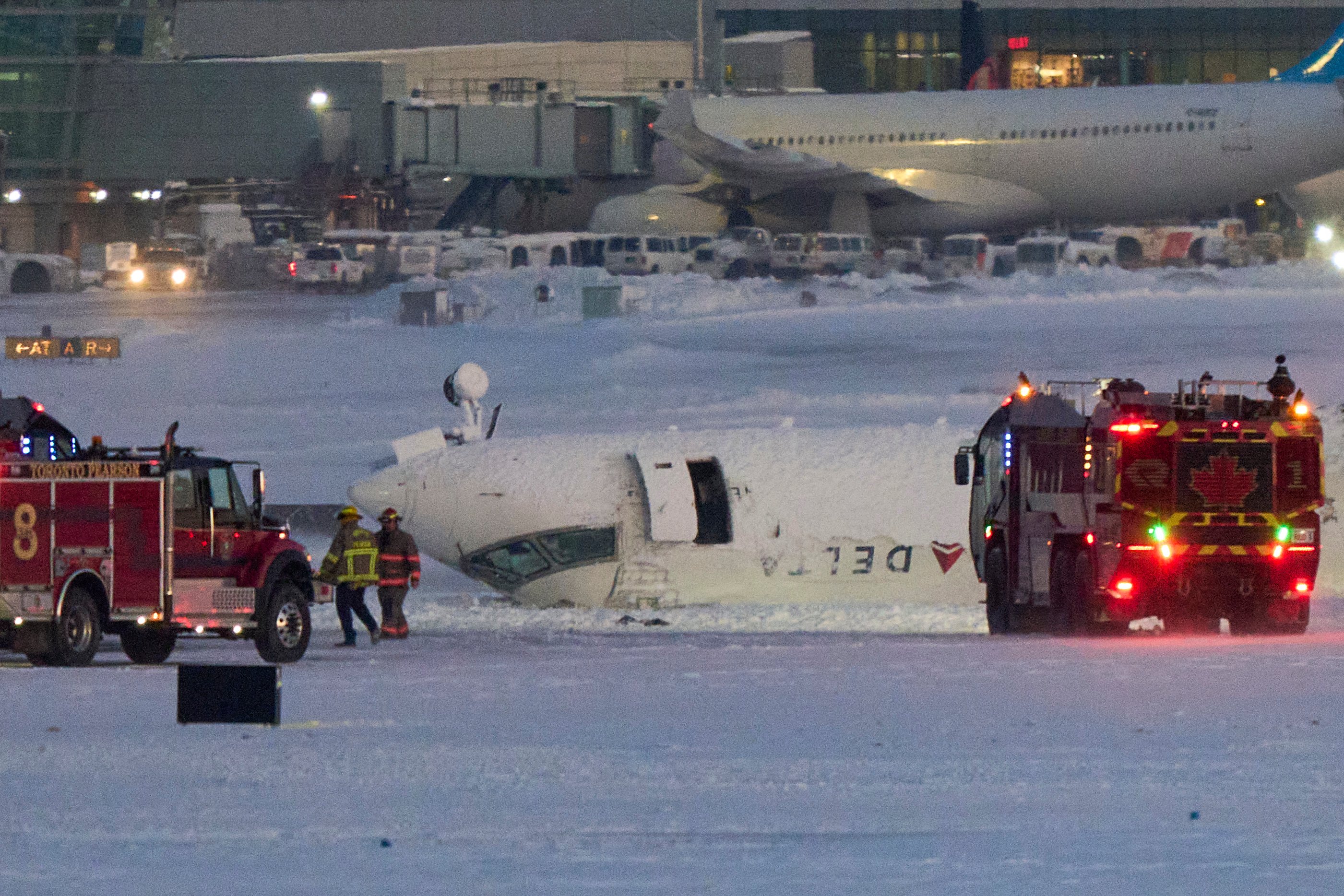 A Delta Air Lines plane pictured after crashing upon landing at Toronto Pearson Airport on February 17, 2025, in Toronto, Ontario. | Source: Getty Images