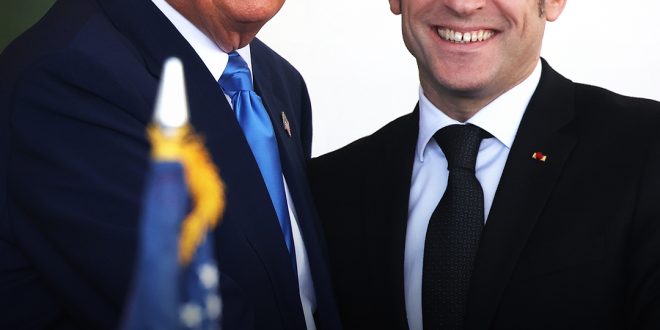 Body Language Expert Reveals the Meaning Behind Donald Trump & Emmanuel Macron's 'Intense' Handshake