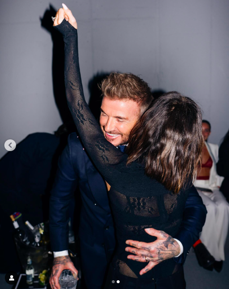 Victoria Beckham hugging David Beckham at his event. | Source: Instagram/victoriabeckham