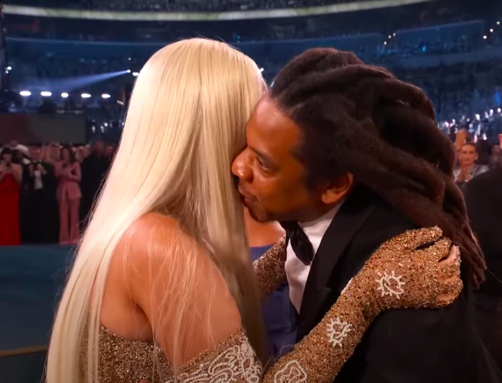 Jay-Z whispering something into Beyoncé's ear after she won a Grammy. | Source: YouTube/Recording Academy/Grammys