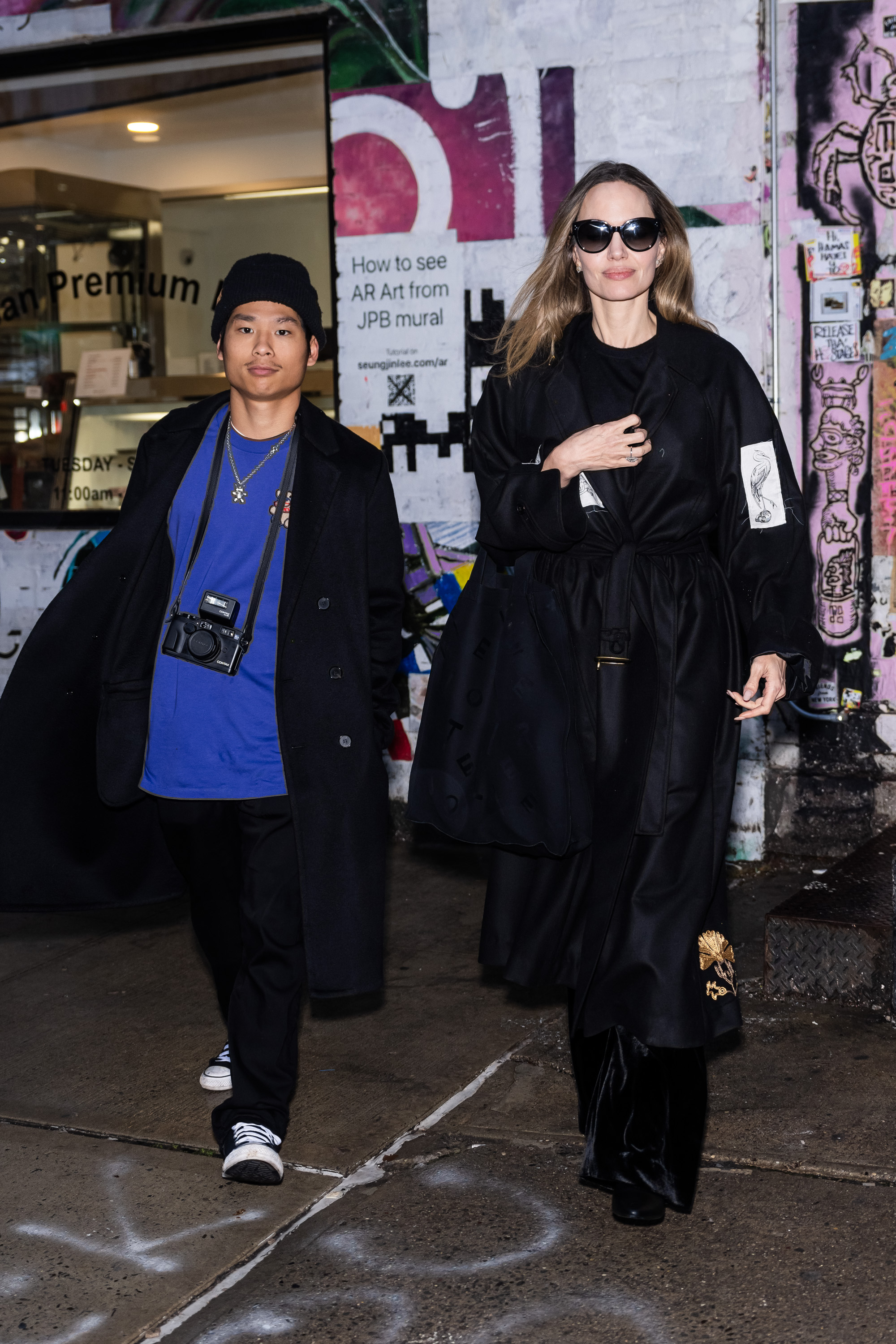 Pax Jolie-Pitt and Angelina Jolie are seen in the East Village in New York City, on December 28, 2023 | Source: Getty Images